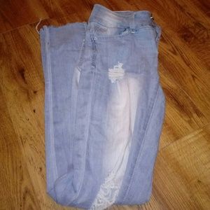 Partly bleached medium rise frayed ancle pants